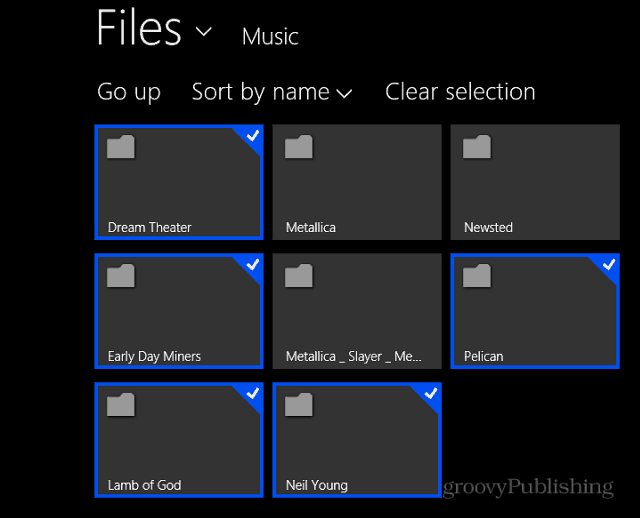 Kaip gauti „iTunes“ muziką „Windows Phone“