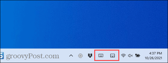 Užduočių juostos kampinės piktogramos sistemoje „Windows 11“.