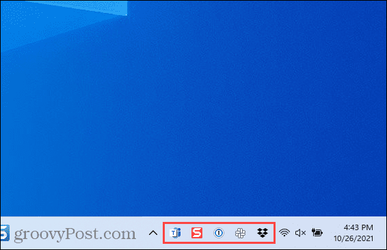 Užduočių juostos kampo perpildymo piktogramos sistemoje „Windows 11“.